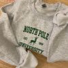 North Pole Uni Embroidered Christmas Gift Shirt North Pole Uni Embroidered Christmas Gift Shirt