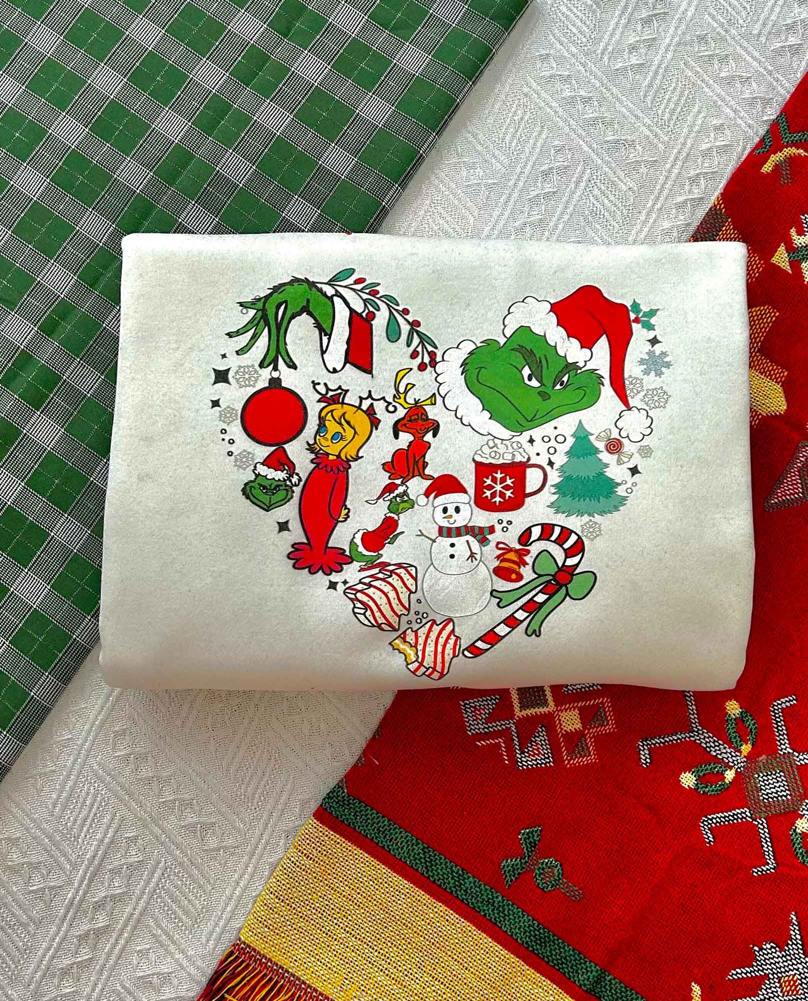 HOT TREND Heart Grinch Christmas sweatshirt HOT TREND Heart Grinch Christmas sweatshirt